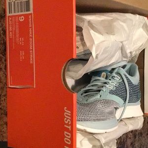 Women’s Nike Zoom Strike tennis shoes.